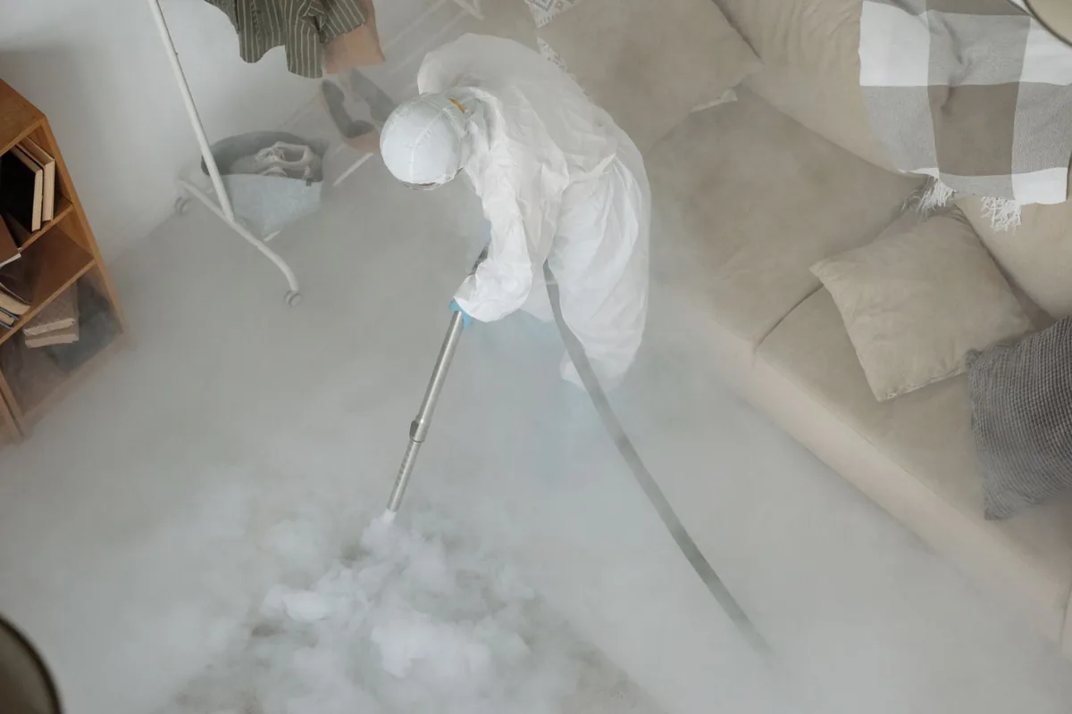 Biohazard cleanup technician in protective equipment, Waverly, VA